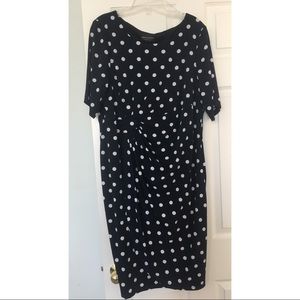 Flattering, navy and white polka dot dress